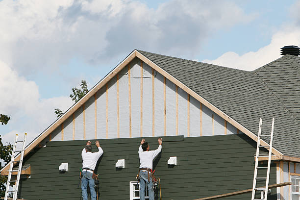 Professional Siding Contractor technician working in Traphill, NC